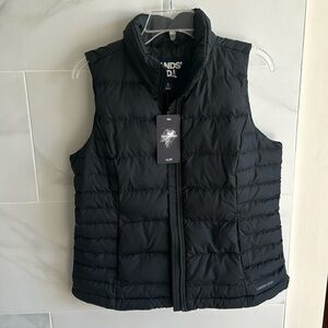 Women’s black puffer vest. New with tags.